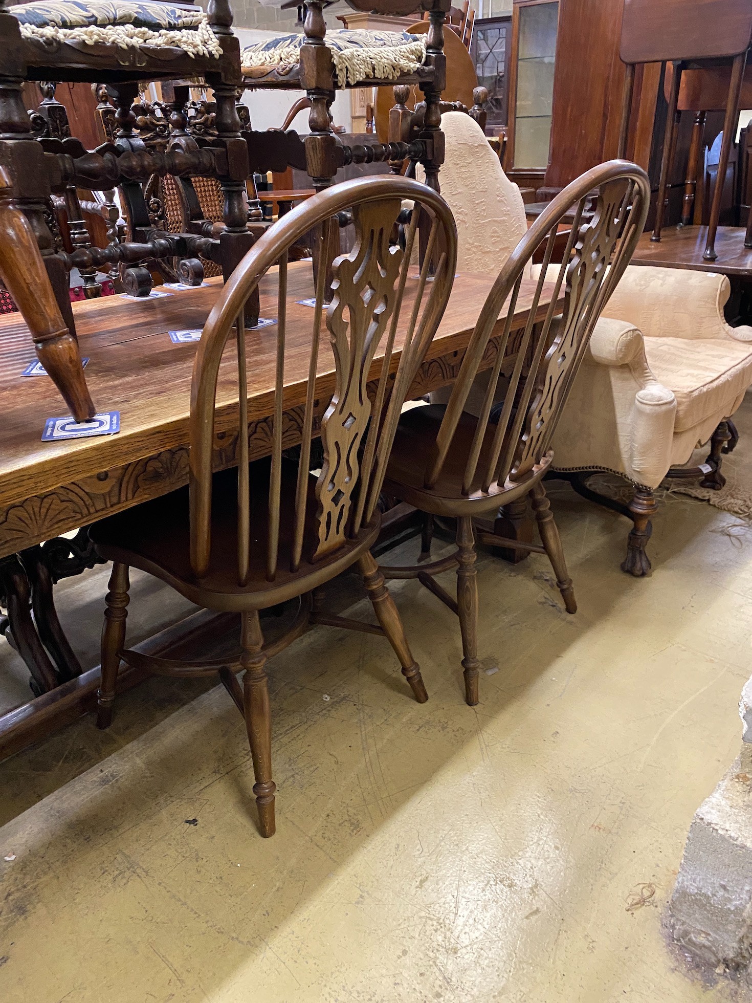 Five reproduction Windsor elm and beech dining chairs, one with arms